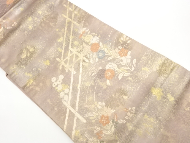 引箔ヱ霞に草花・柵模様織出し名古屋帯